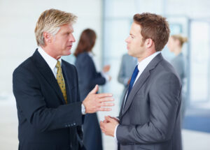 A field marketing professional interacting with a client in person
